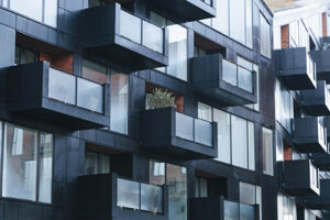 contemporary-black-building-exterior-wit-balconies